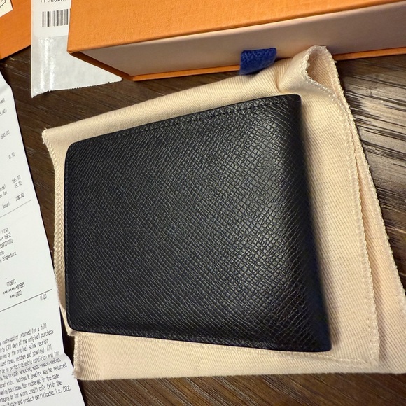 Authentic Louis Vuitton multiple wallet in Taiga Noir w/ receipt, jacket, & box - Picture 3 of 11